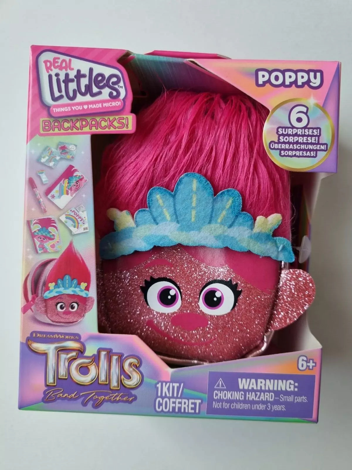 REAL LITTLES™ Trolls Mini Backpack – Licensed Trolls Clip-On Backpack with 6 Surprise Accessories (Random Model & Colors, Ages 6+)